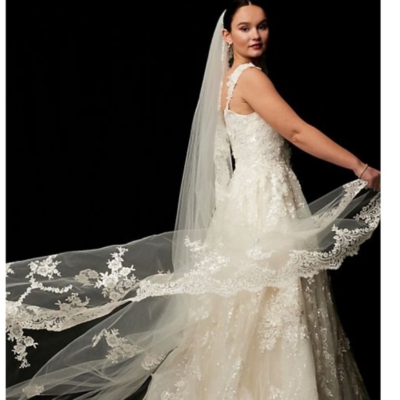 I am selling my strapless, ivory , ruffled mermaid wedding gown. - Picture 9 of 11